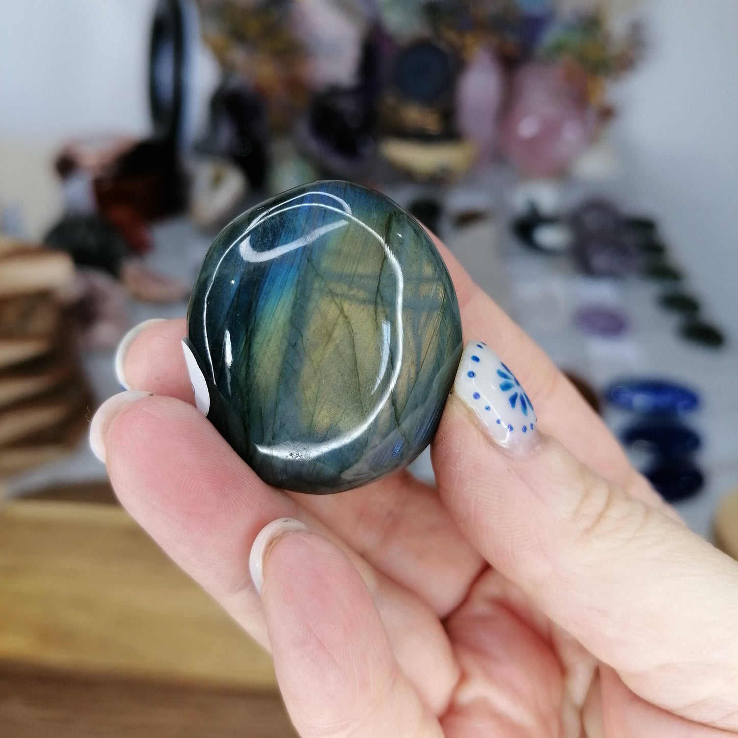 blue and orange flash labradorite palmstone