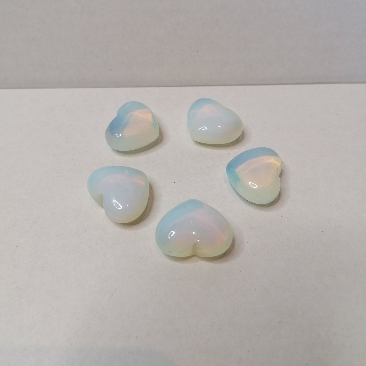 five opalite hearts