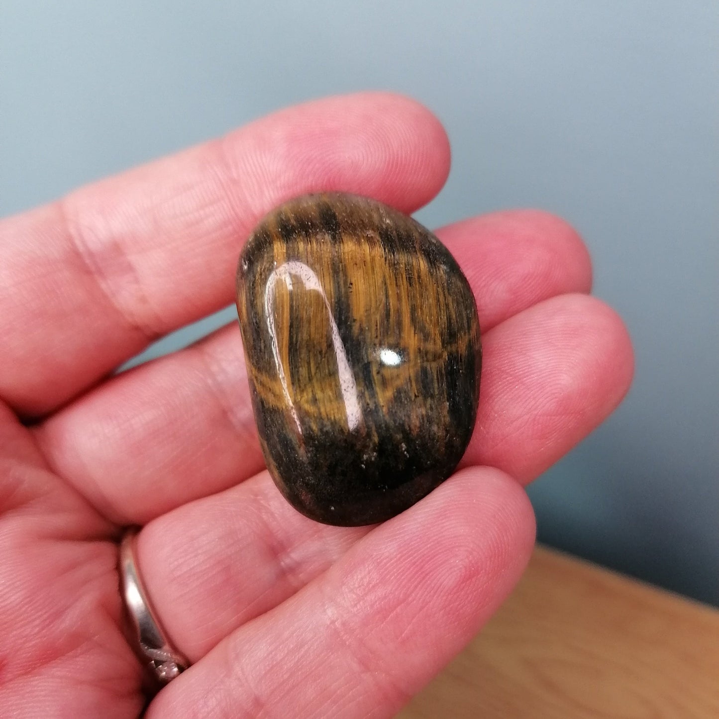 Large Blue Black and gold tigers eye tumblestone with sparkly flash