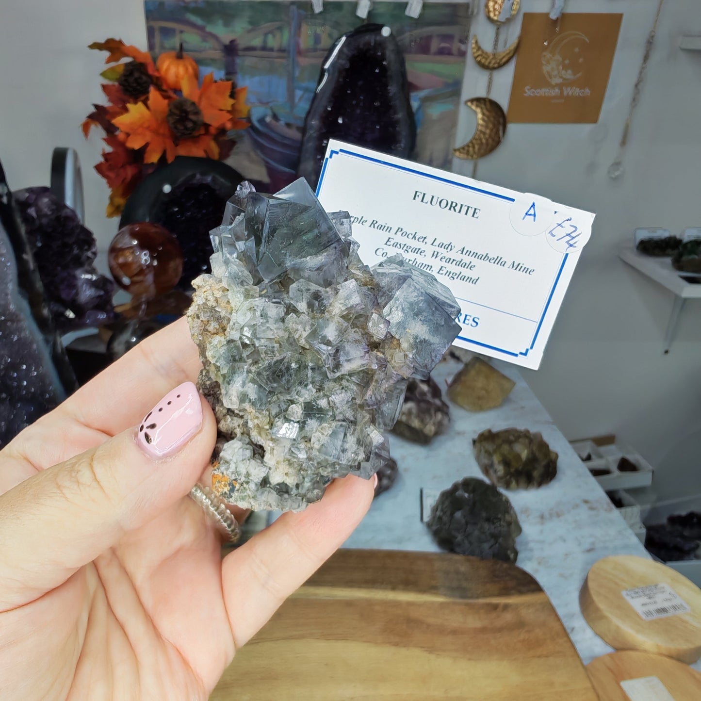 Purple Rain Pocket UK Fluorite Specimen with a clear twin cube