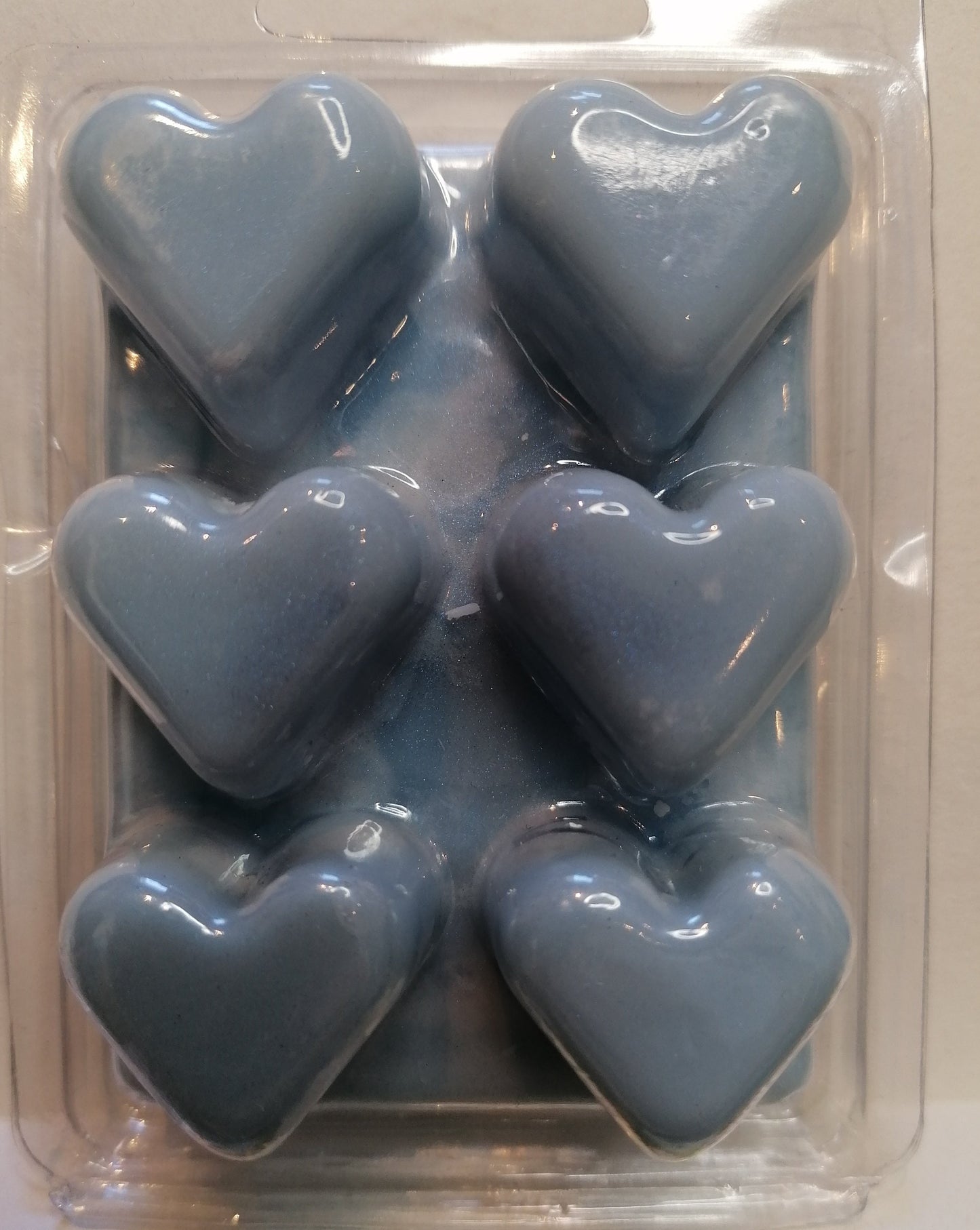 black wax melt in hear clamshell
