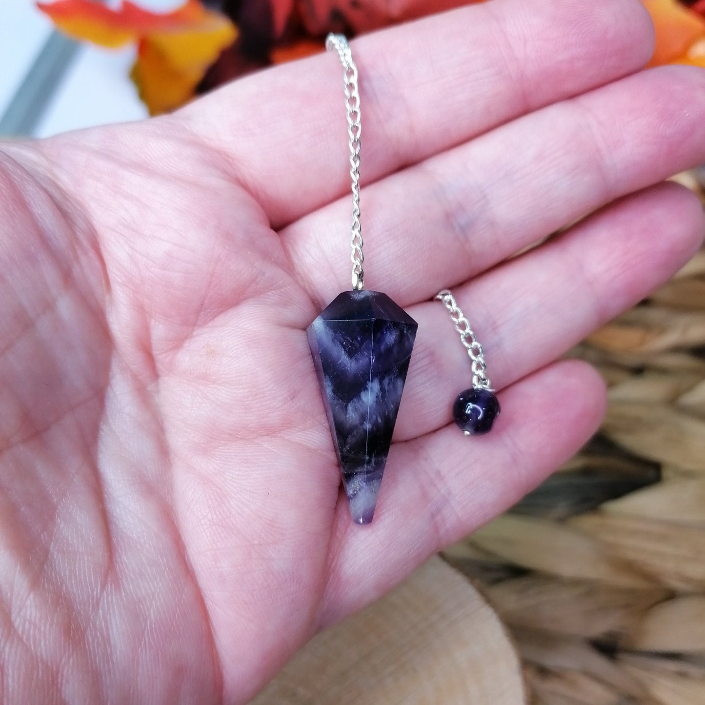 Purple Amethyst Crystal Pendulum with white banding used for rituals