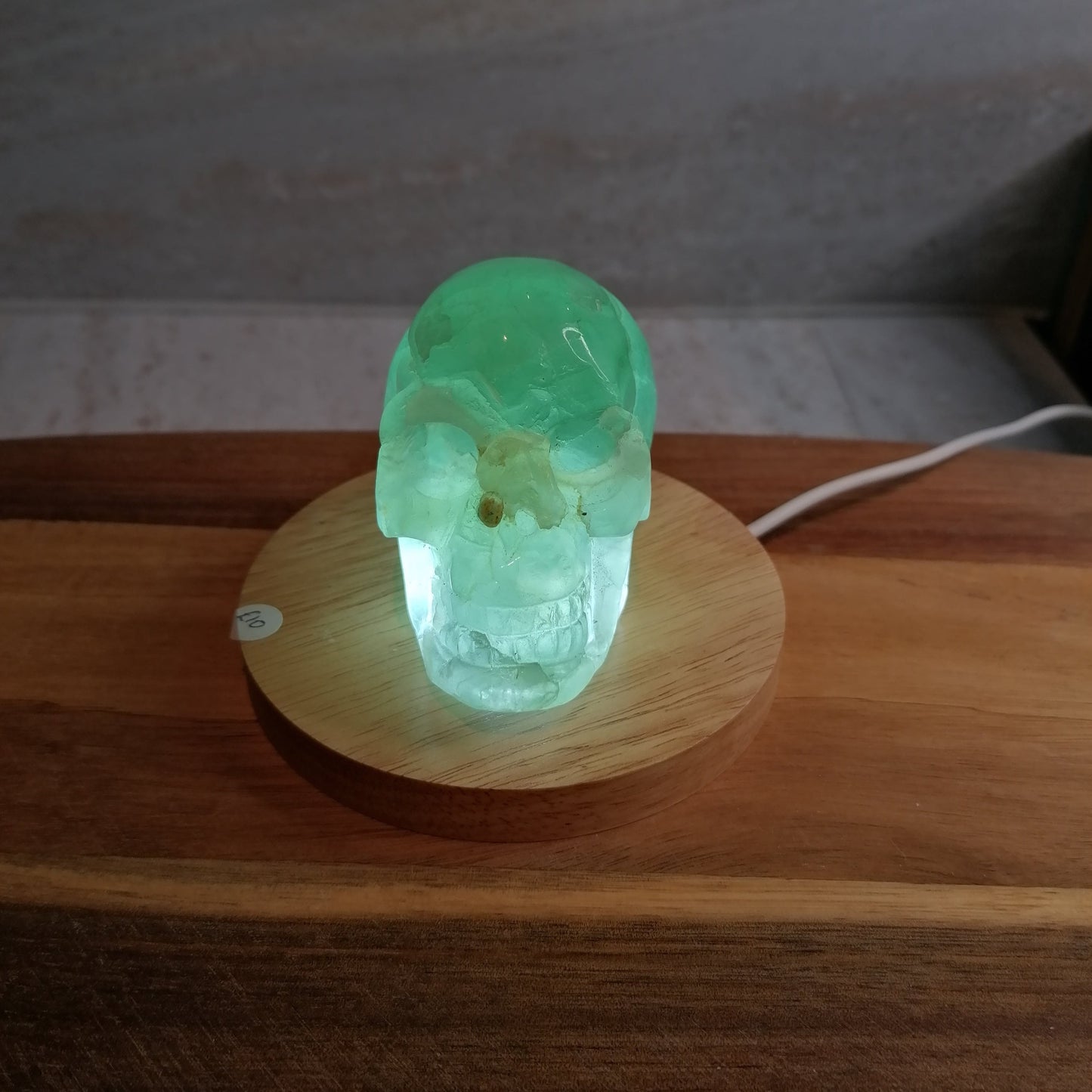 Light Green Fluorite Skull on light pad