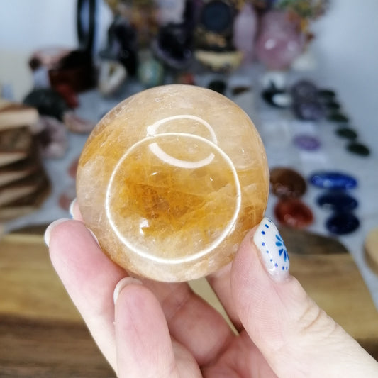golden healer palmstone with shades of light and dark orange