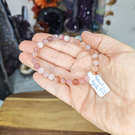 High Grade Apricot Agate 6mm Bead Bracelet with pastel pink beads