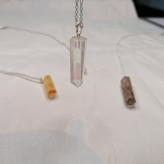 clear quartz point necklace on silver chain