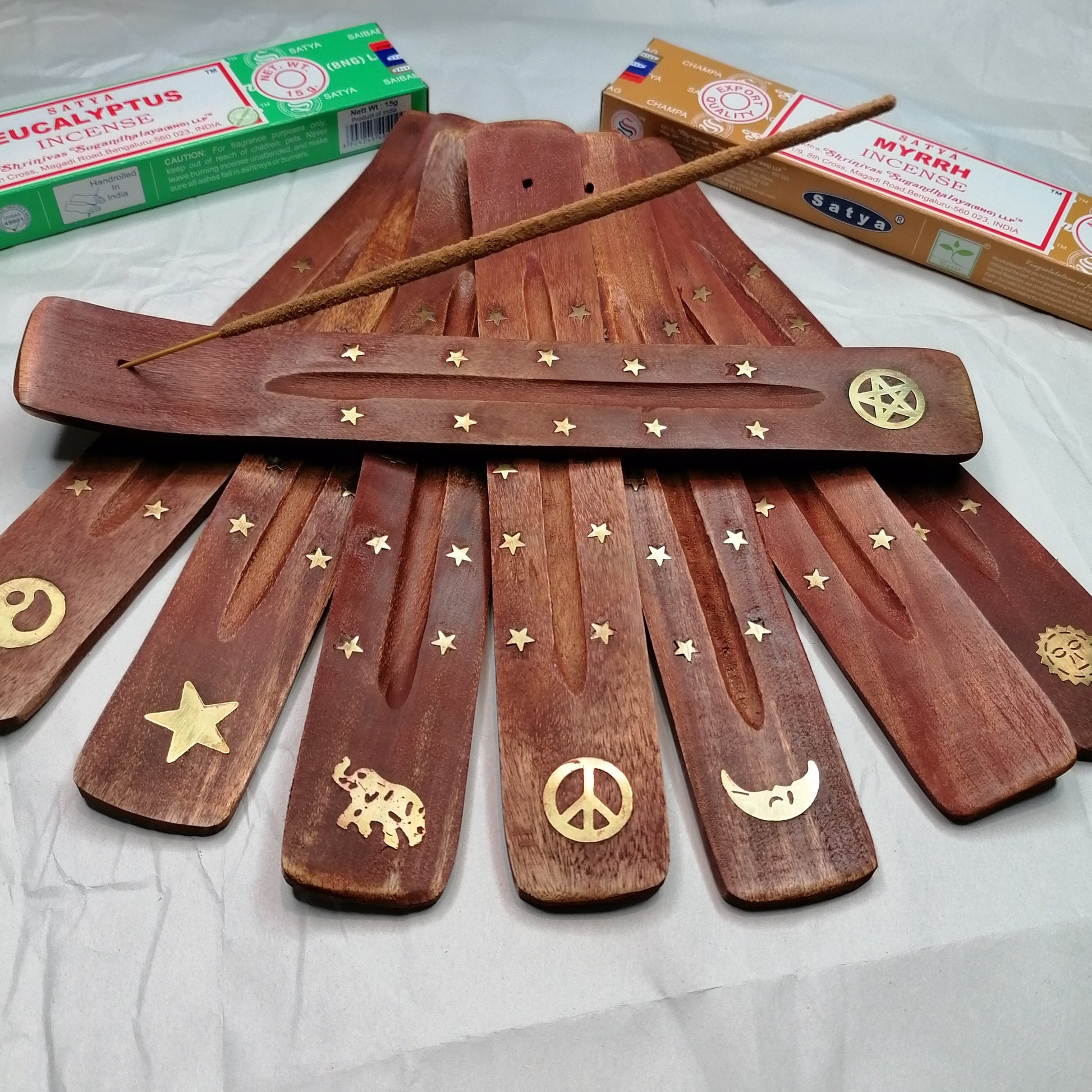 full range of incense holders with an incense stick