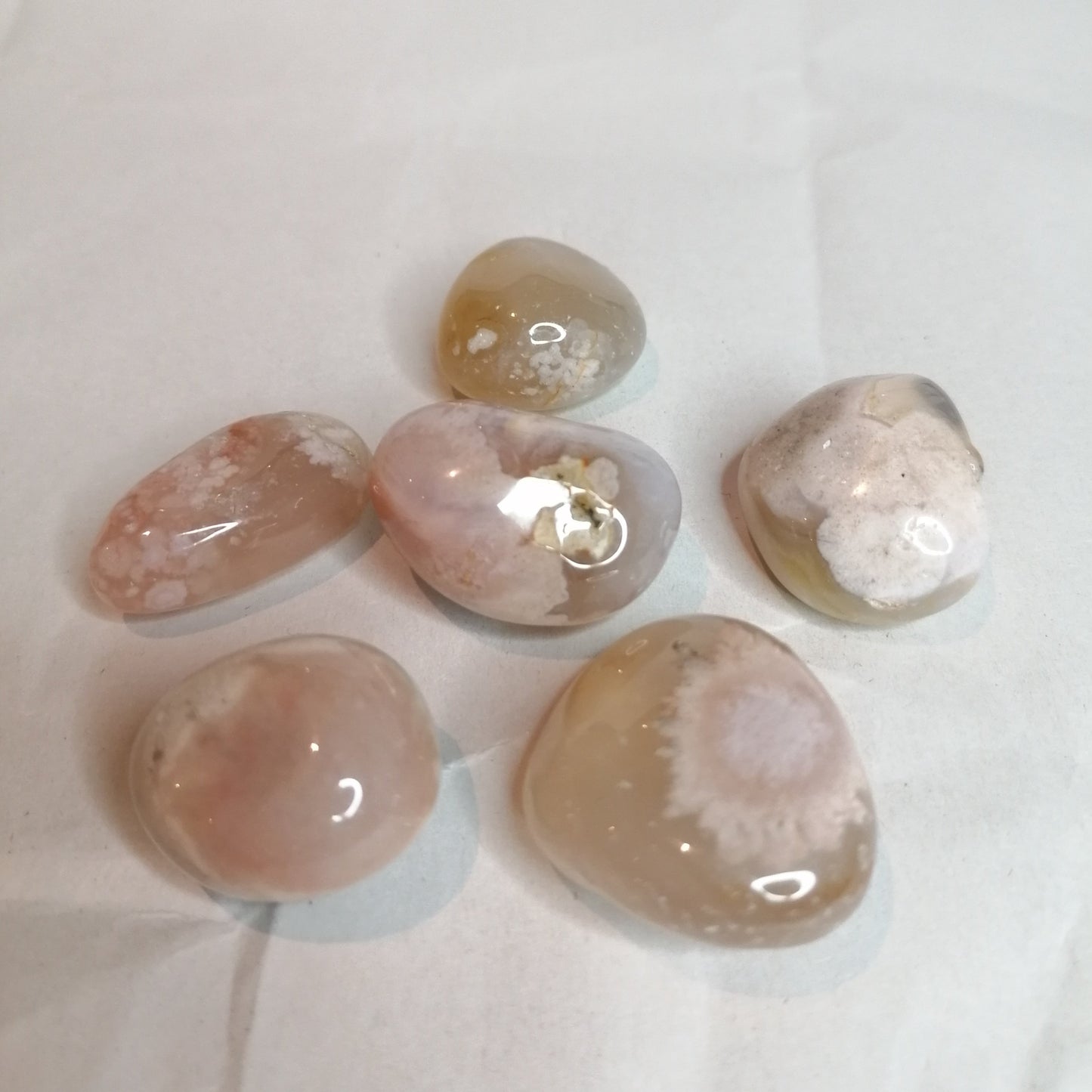 light pink flower agate tumblestones with inclusions