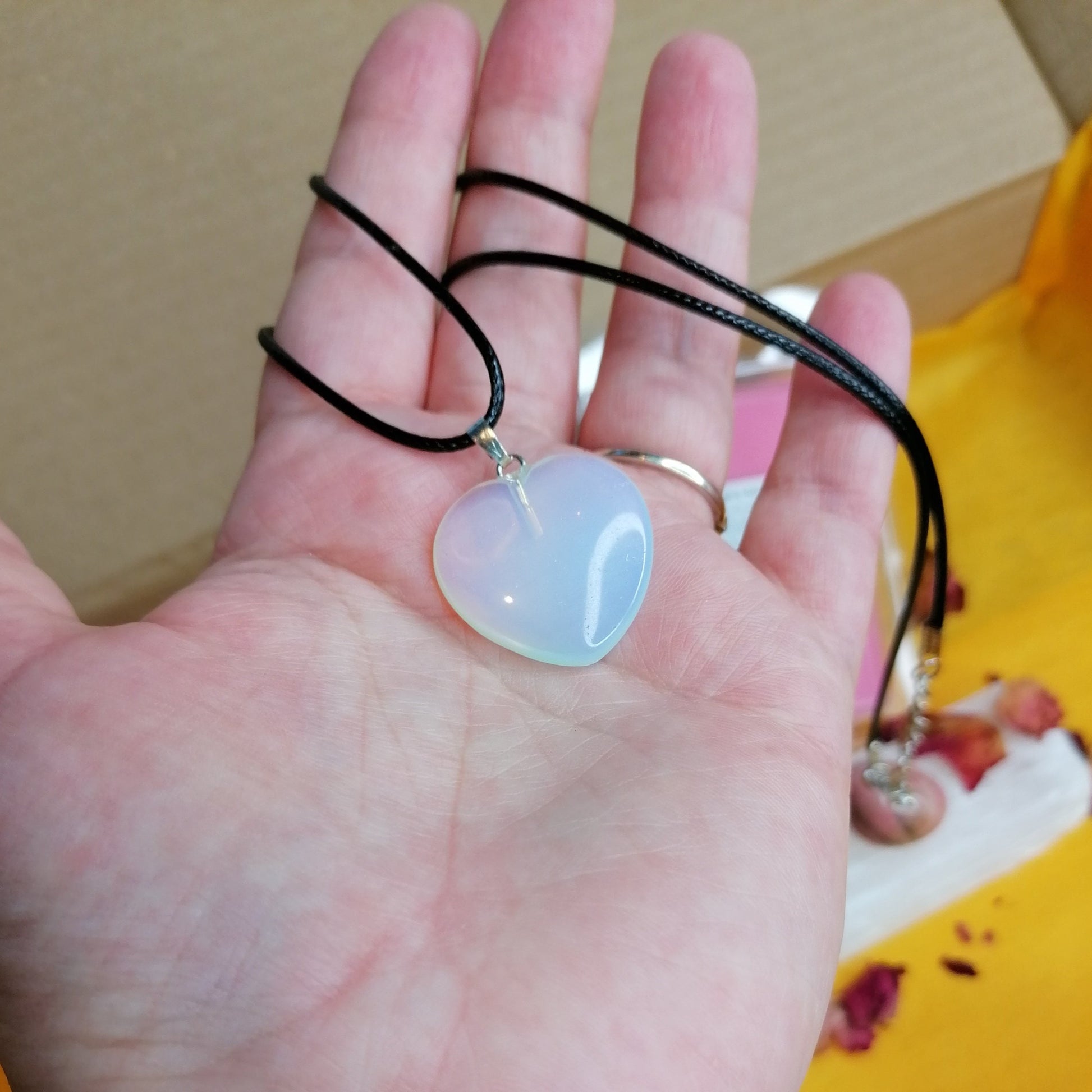 close up look at the opalite heart necklace