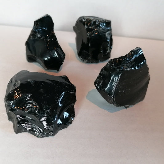 large raw black obsidian chunks