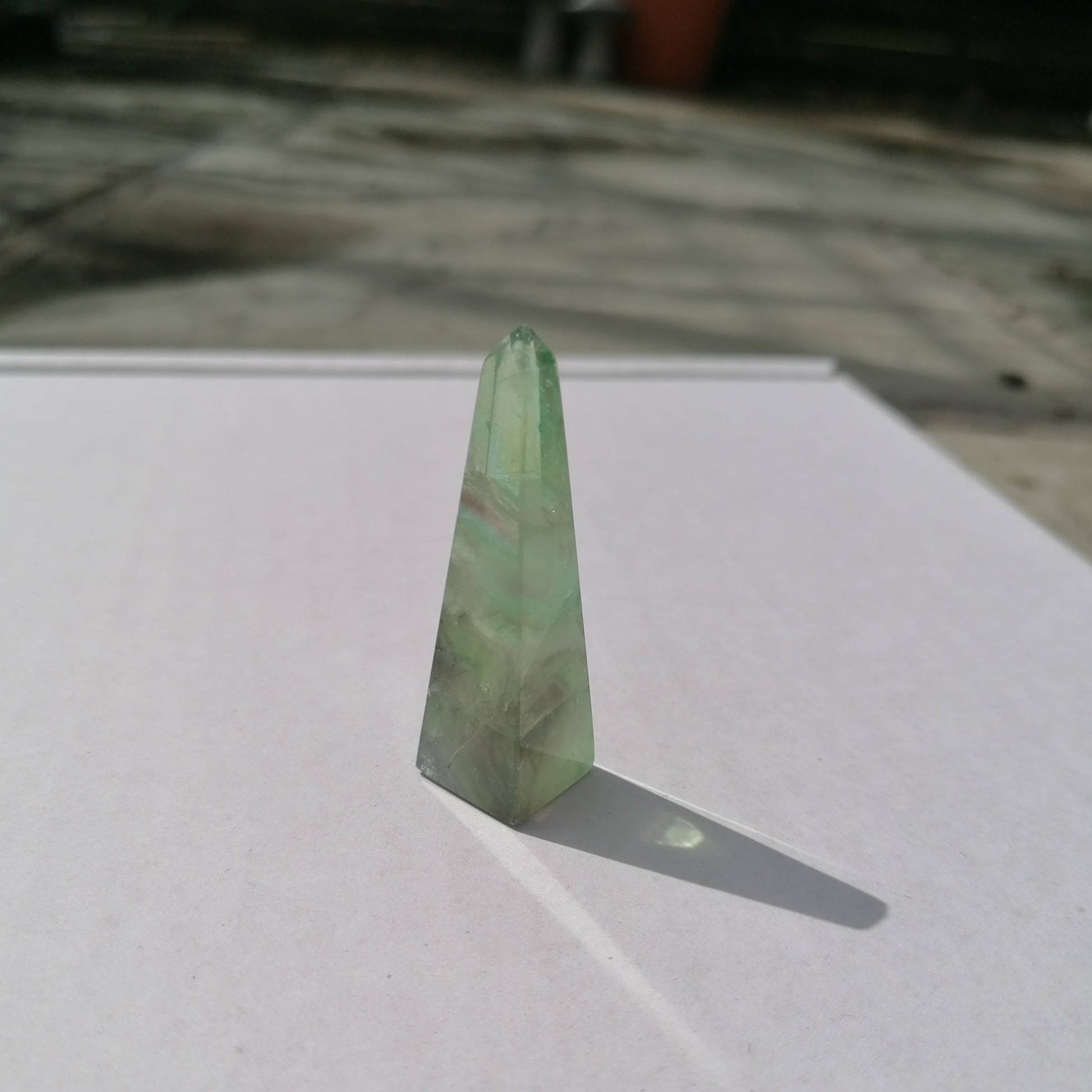 green with purple inclusions fluorite tower