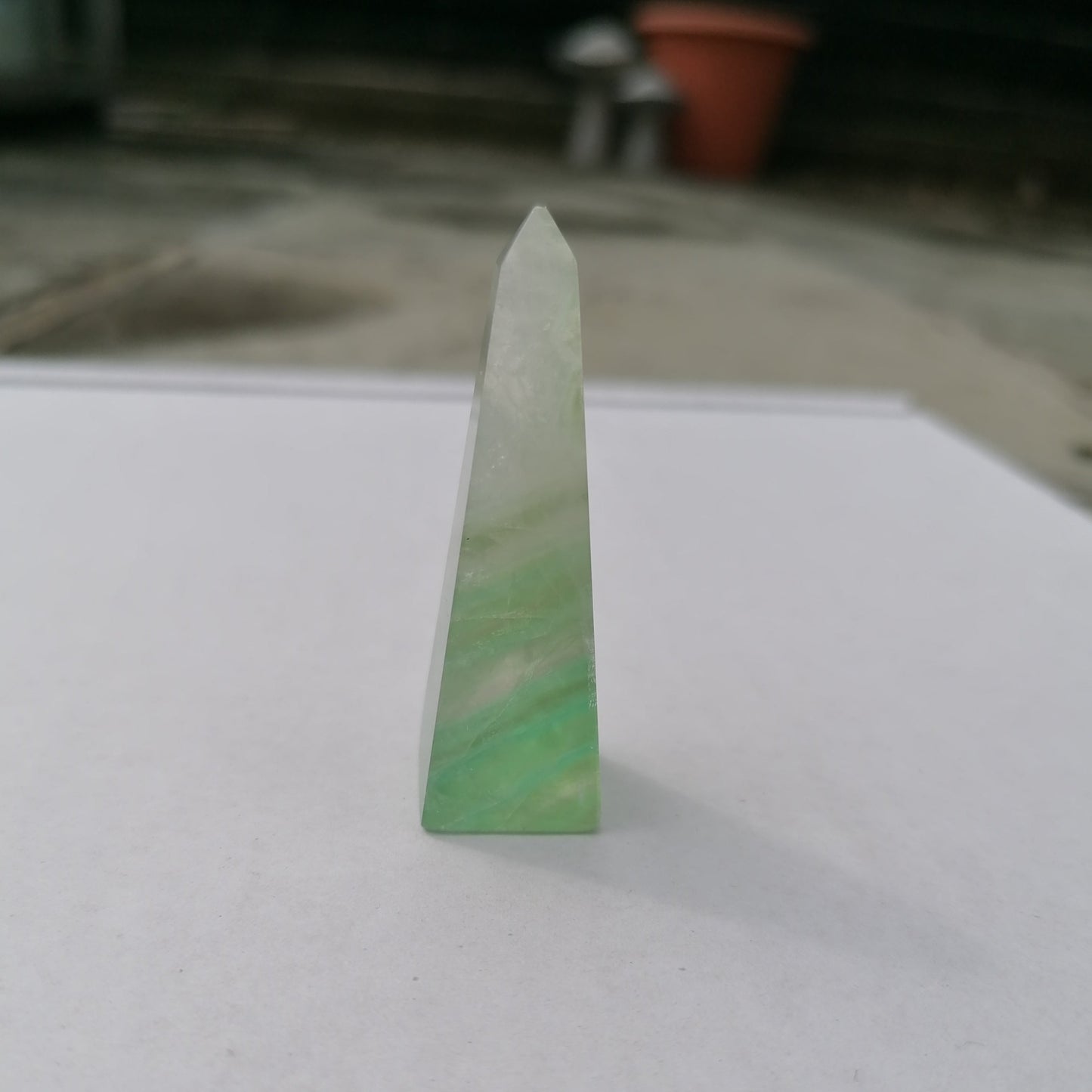 green and white fluorite obelisk tower