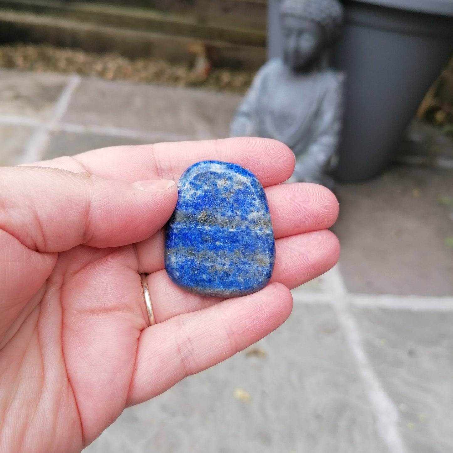 blue pais lazuli smoothstone in the light