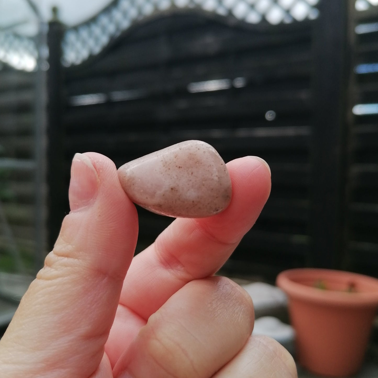 pink amethyst tumble in the  light