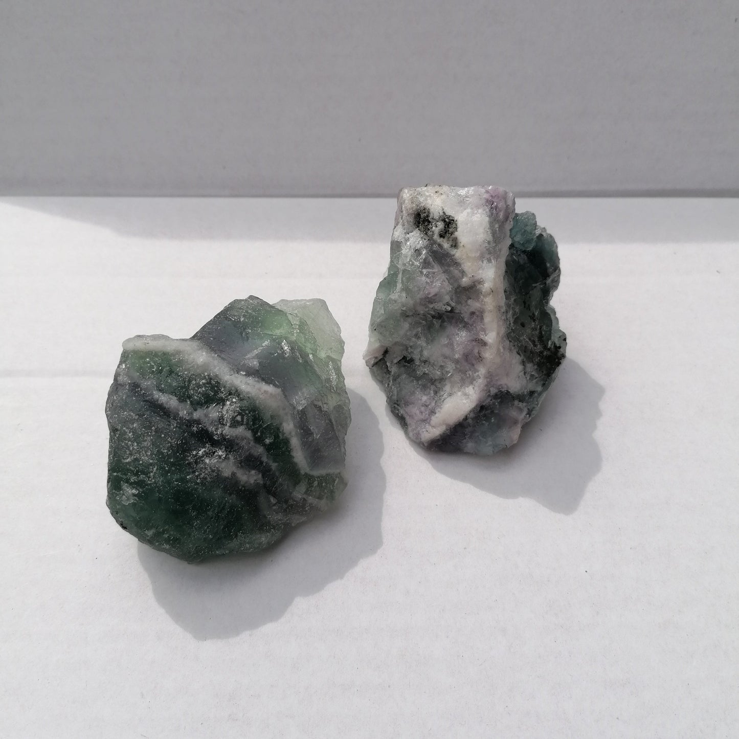 large green, purple and white fluorite chunks