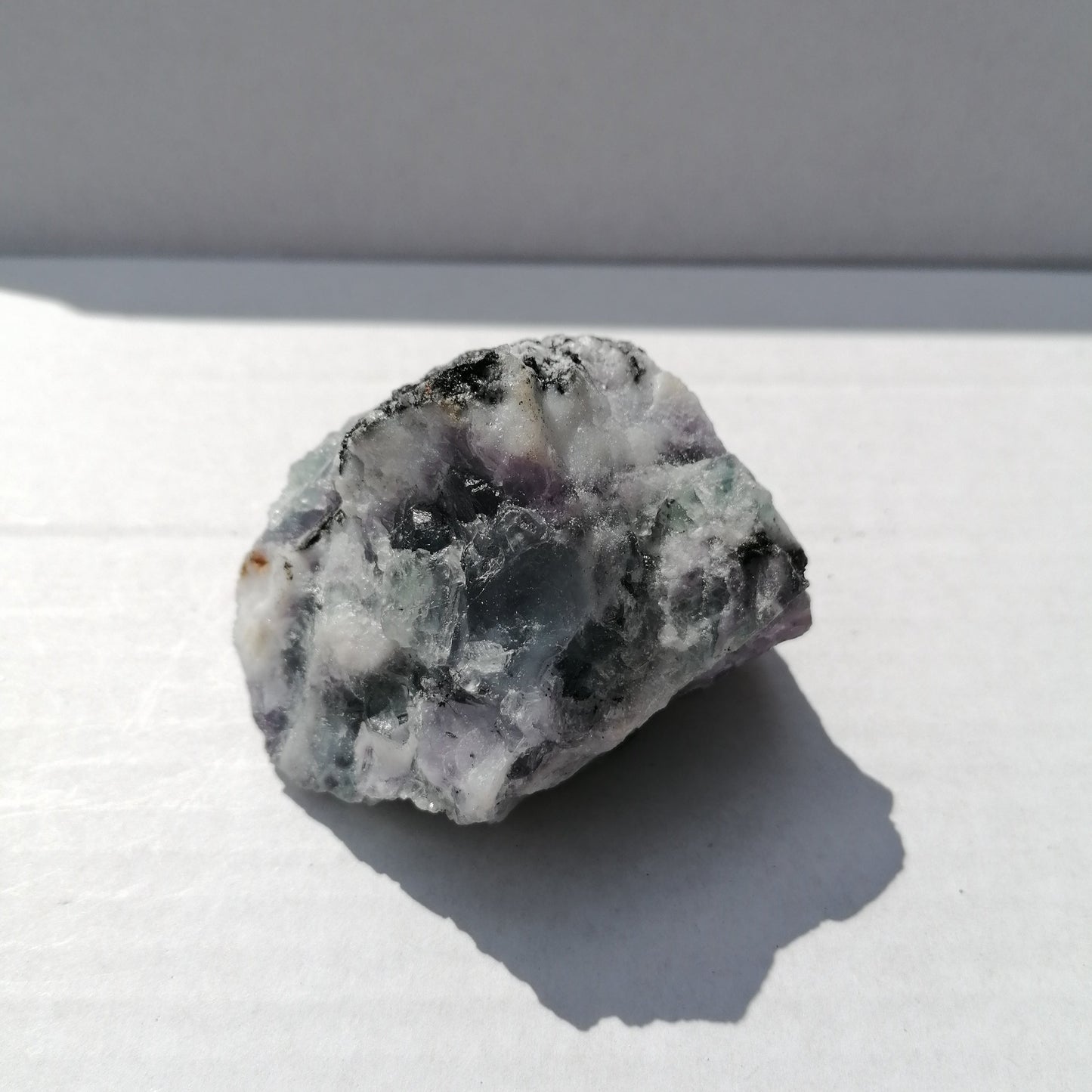 purple green and white large fluorite rough chunk