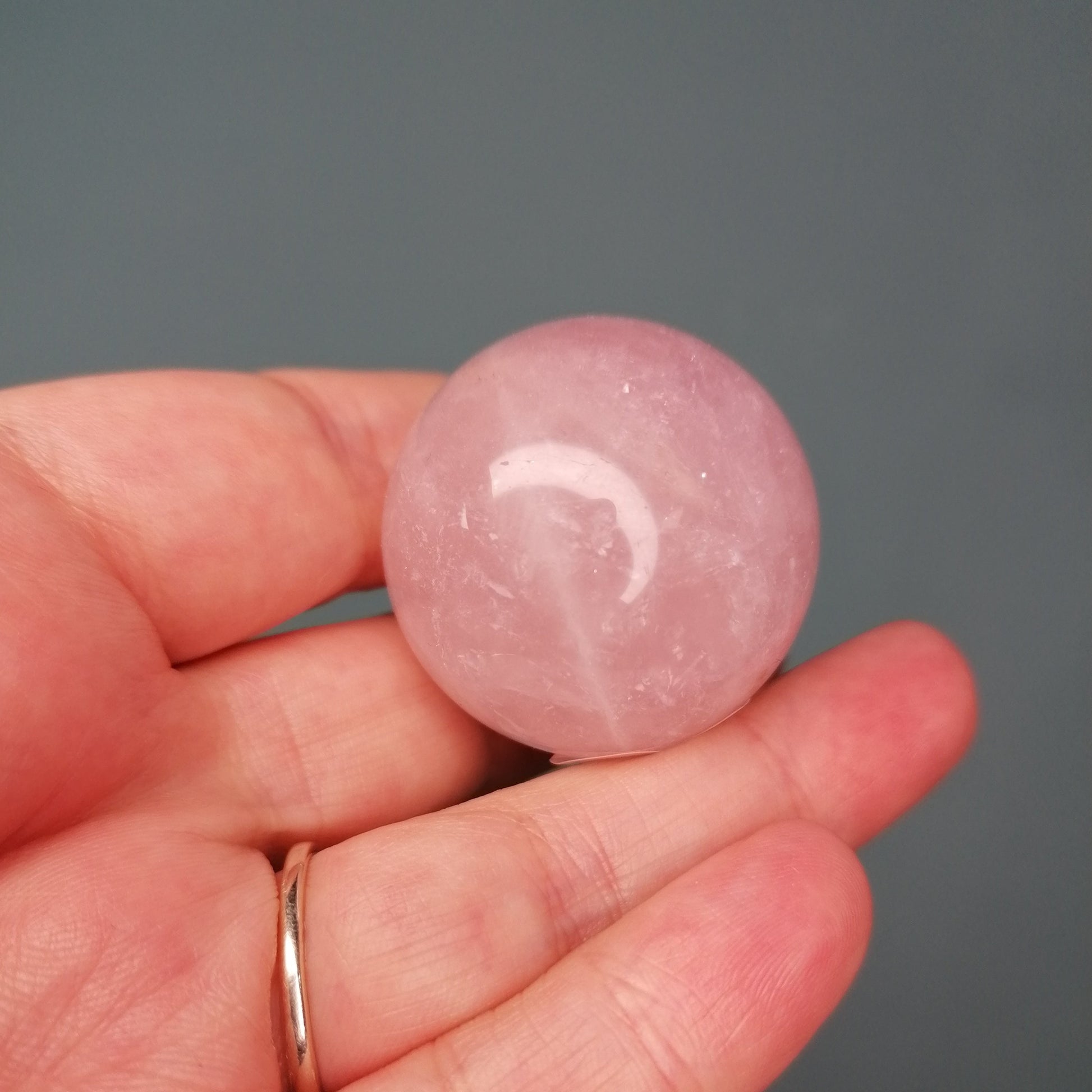 pink rose quartz sphere with white quartz banding