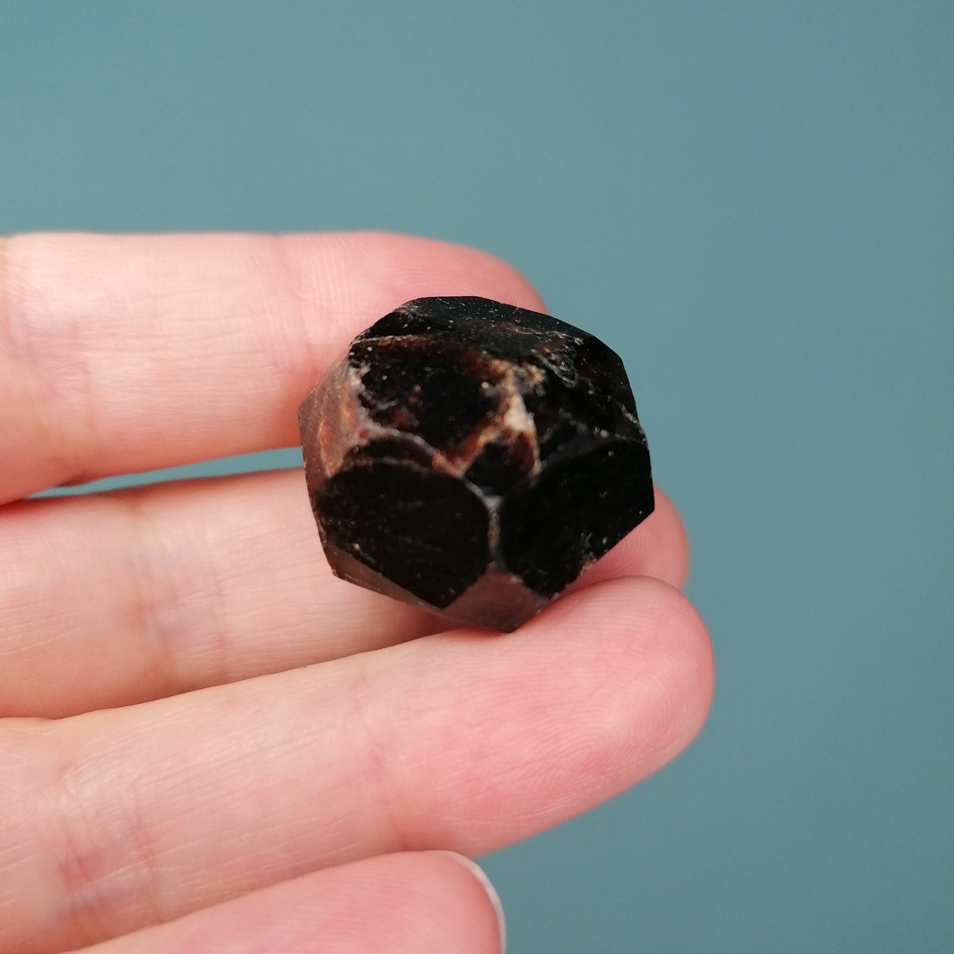 dark red and black almandine garnet