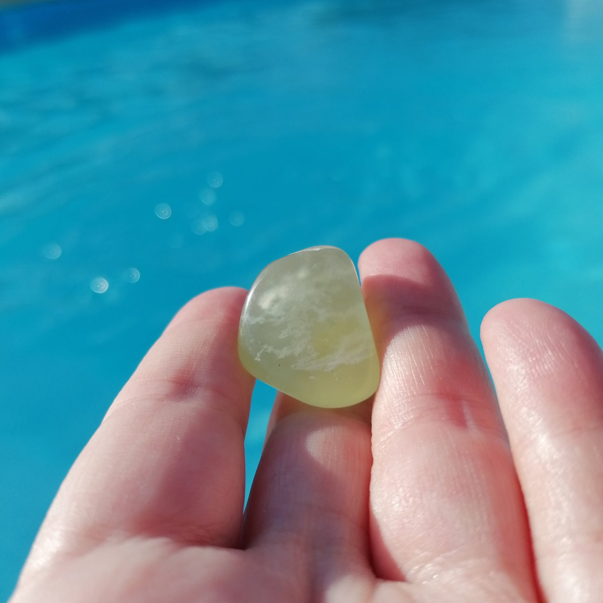 light green new jade crystal by the pool