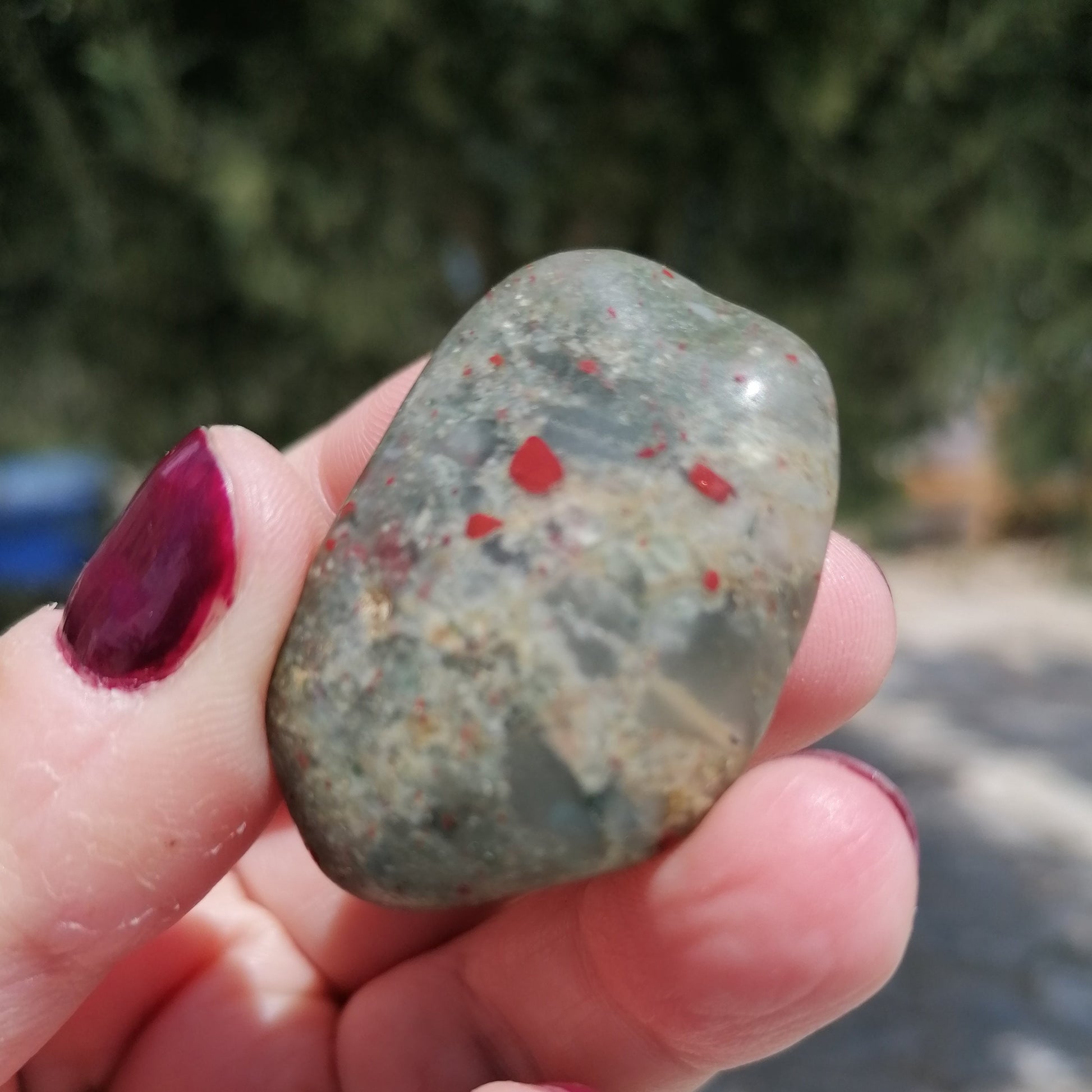 a green and red spotted bloodstone tumble