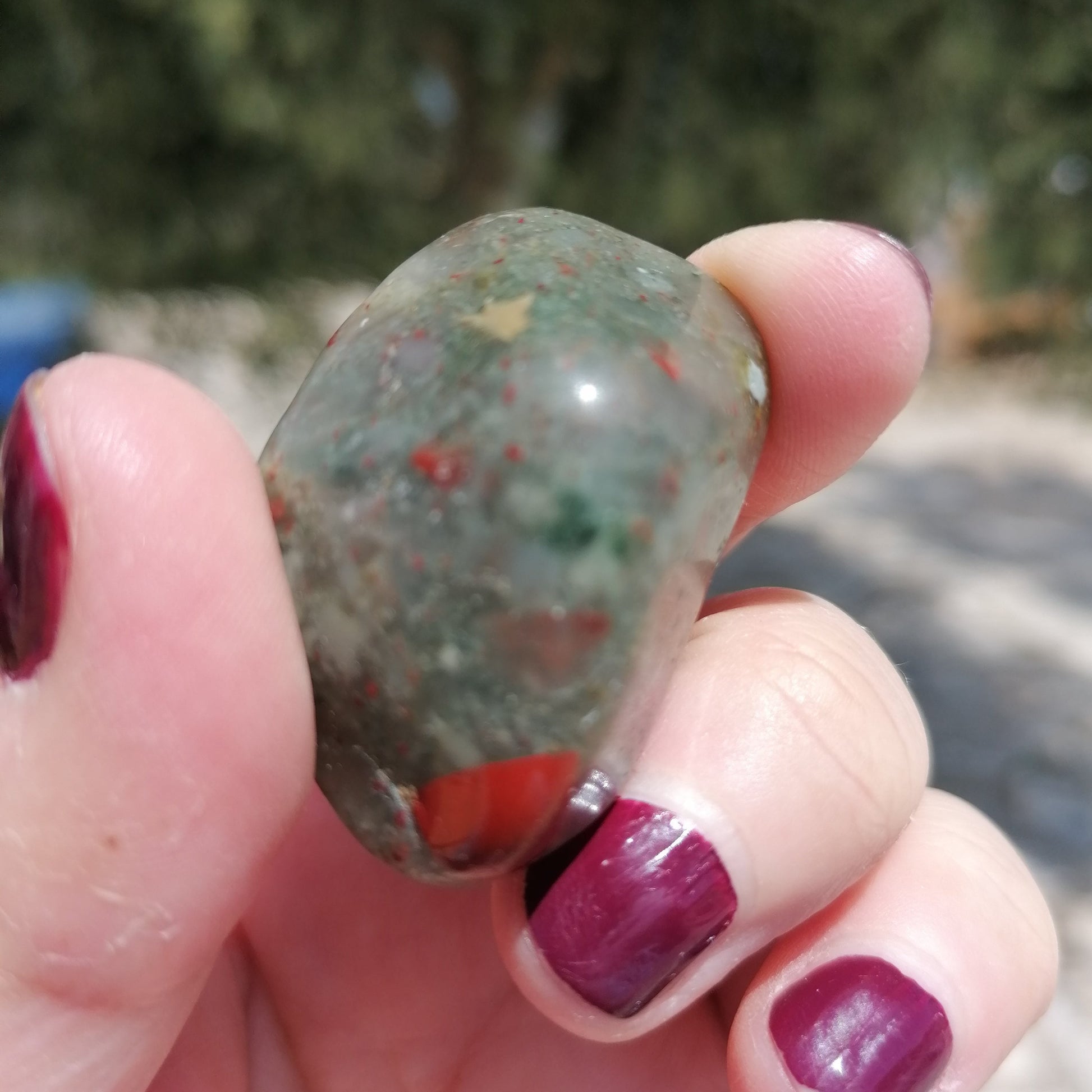 a green and red spotted bloodstone tumble