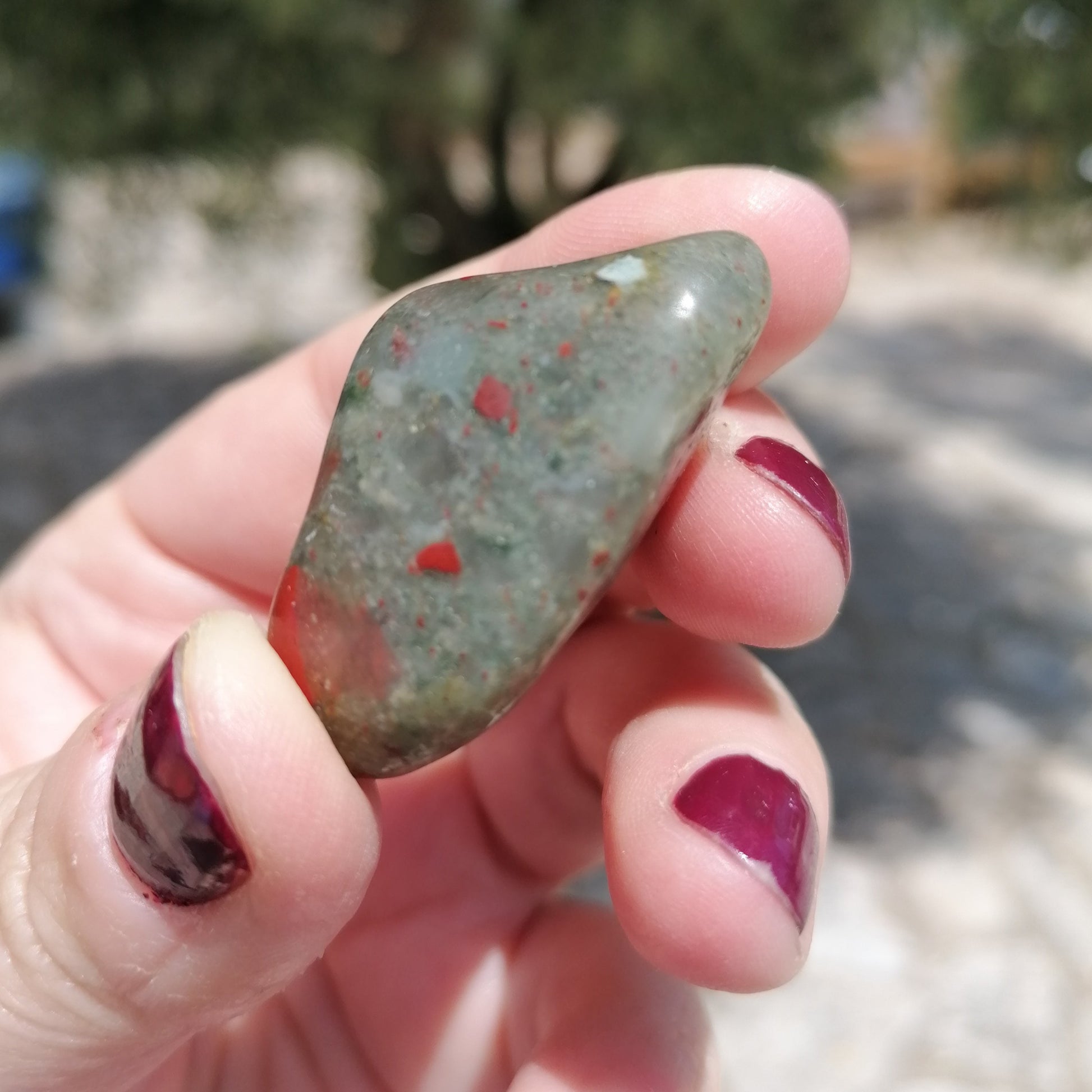 a green and red spotted bloodstone tumble