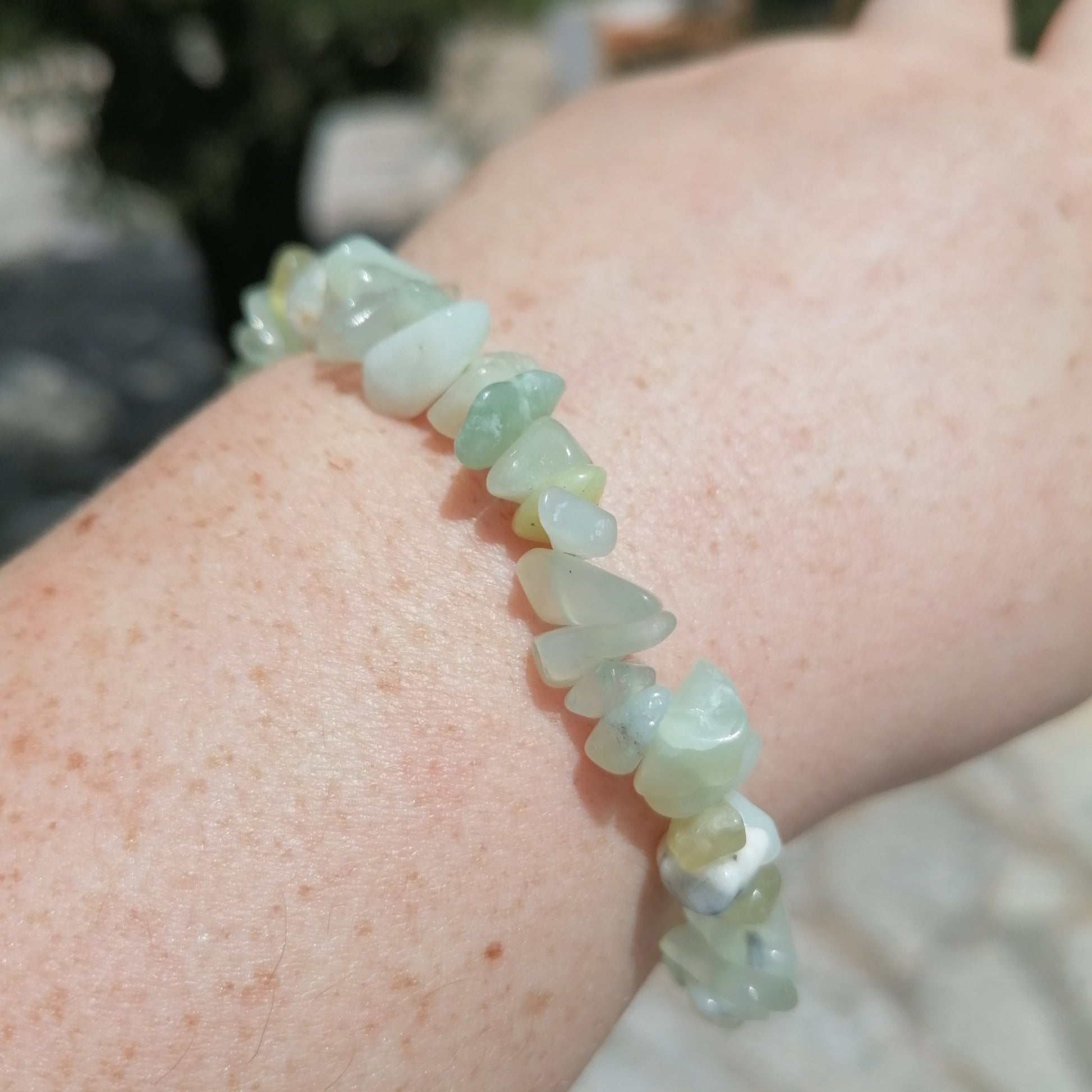 light green new jade crystal chip bracelet on a wrist