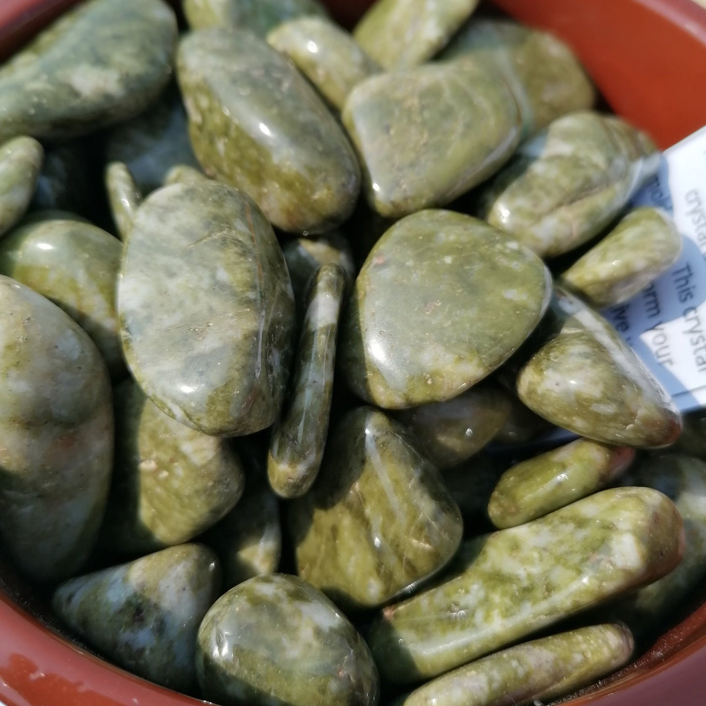 green and white epidot snowflake tumblestones