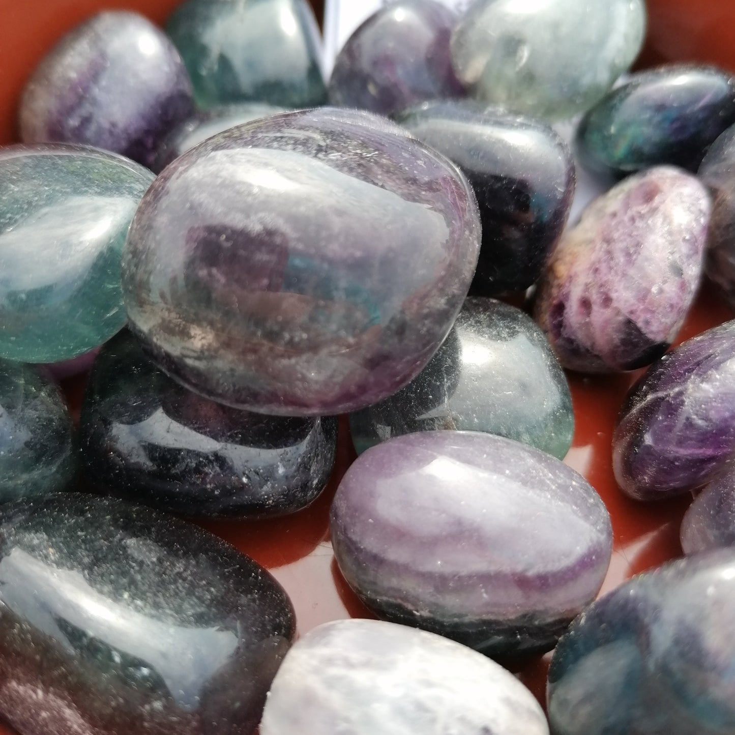 green and purple fluorite crystal tumblestones