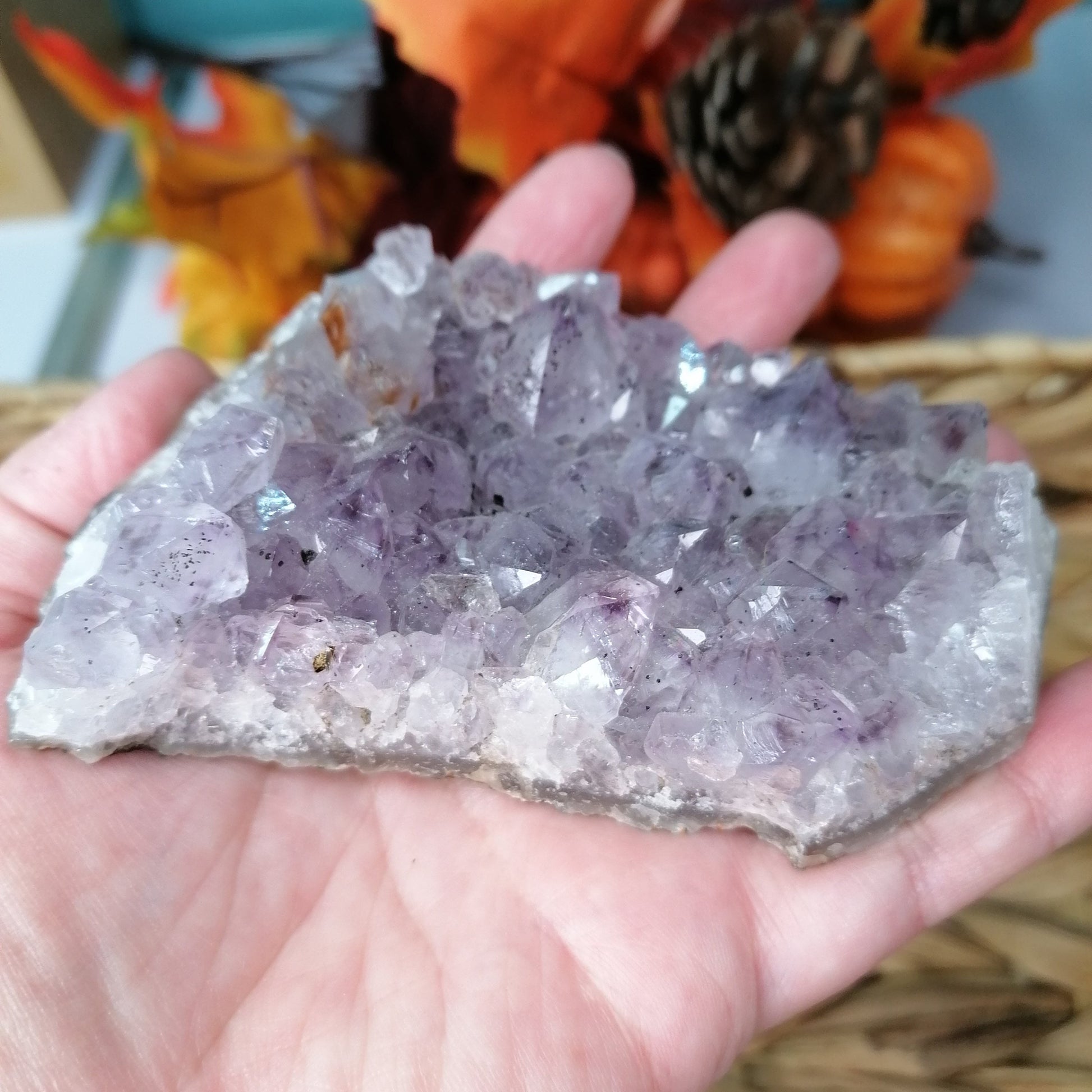 Large Purple Amethyst Cluster with clear quartz edge and black hematite inclusions