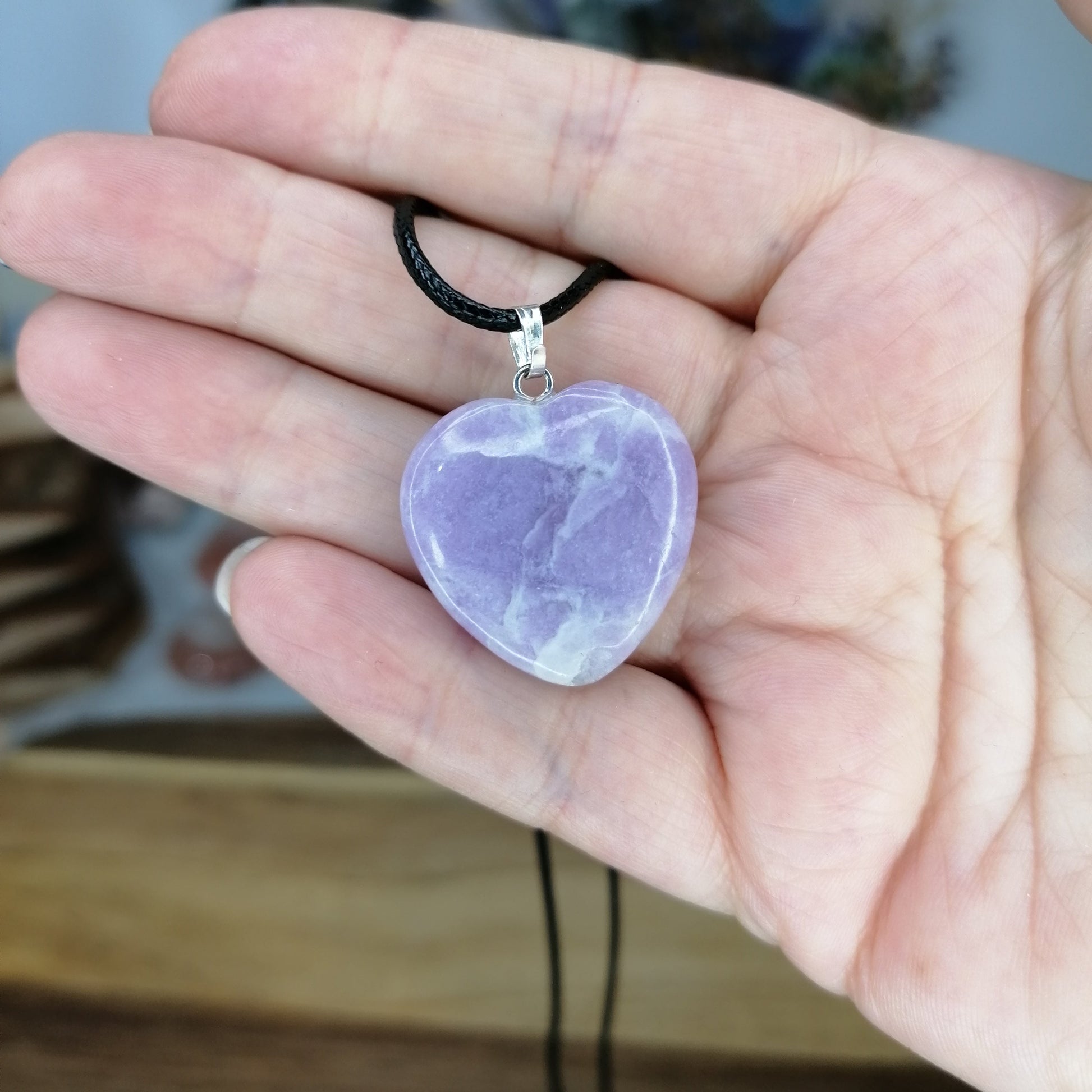Purple Lepidolite Heart Necklace on a black chord chain