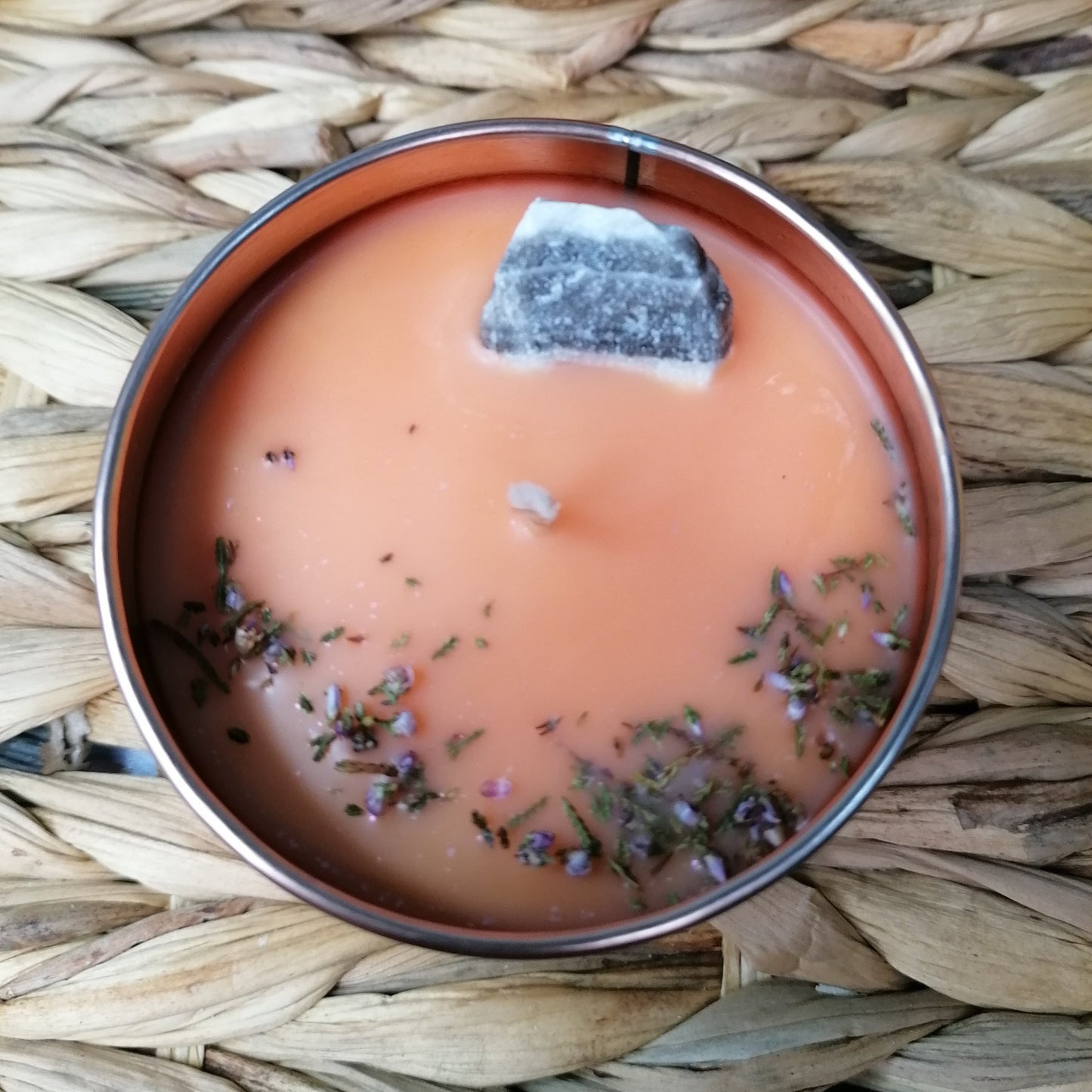 An Orange coloured Salted Caramel scented crystal candle