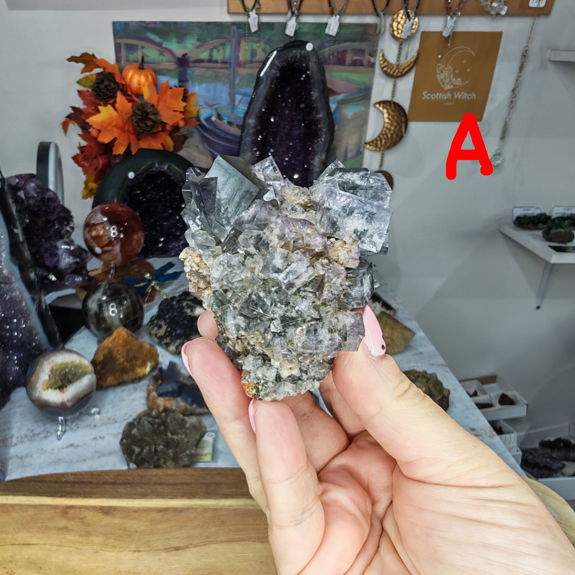 Purple Rain Pocket Fluorite with glassy twin cube