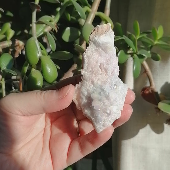 pink aura quartz cluster