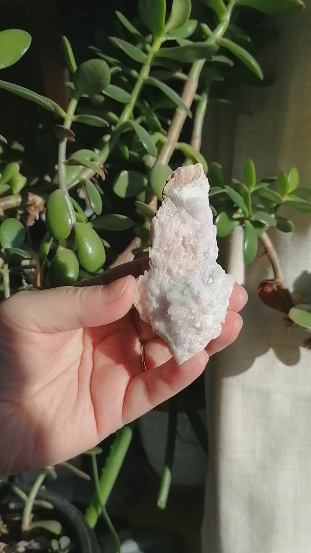 pink aura quartz cluster