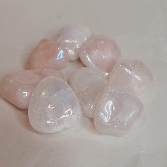 short video of the pink aura rose quartz tumble crystals