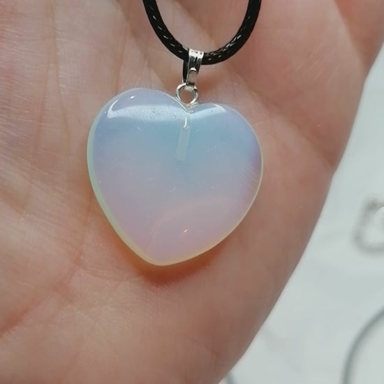 opalite heart crystal shining in the light