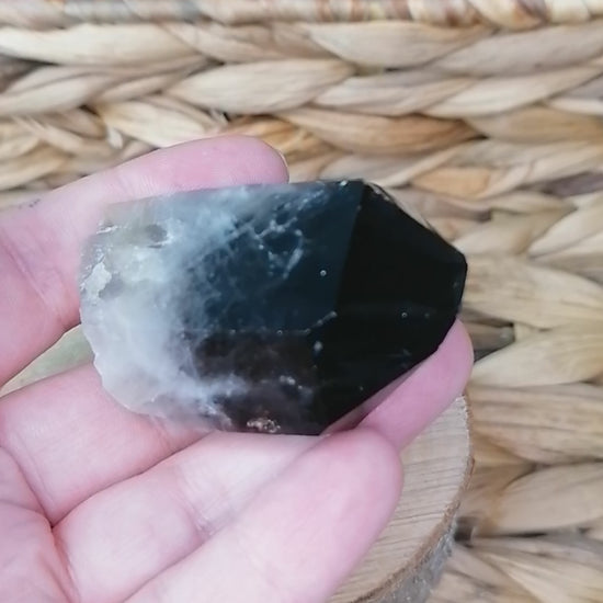 chunky smokey quartz point in the light