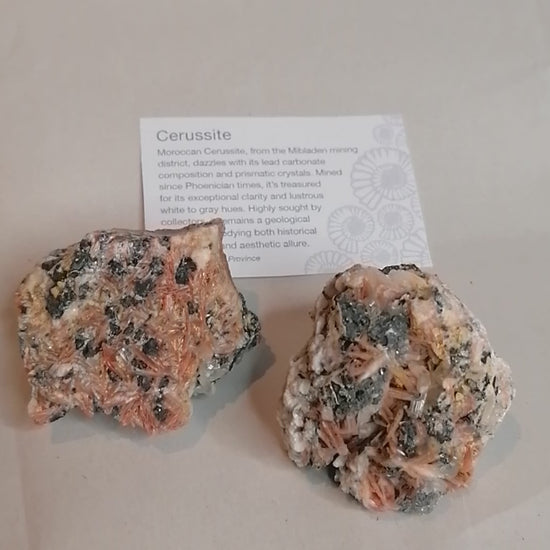 short video showing all sides of the pink cream and silver Cerrusite Beryte Galena Specimens