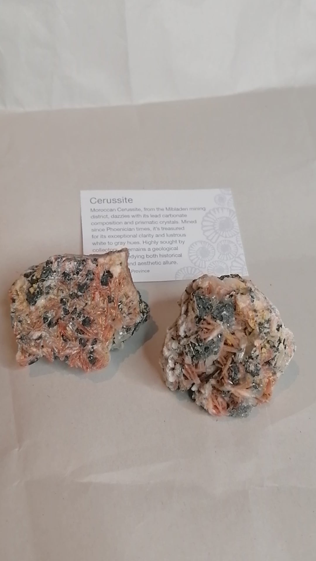 short video showing all sides of the pink cream and silver Cerrusite Beryte Galena Specimens