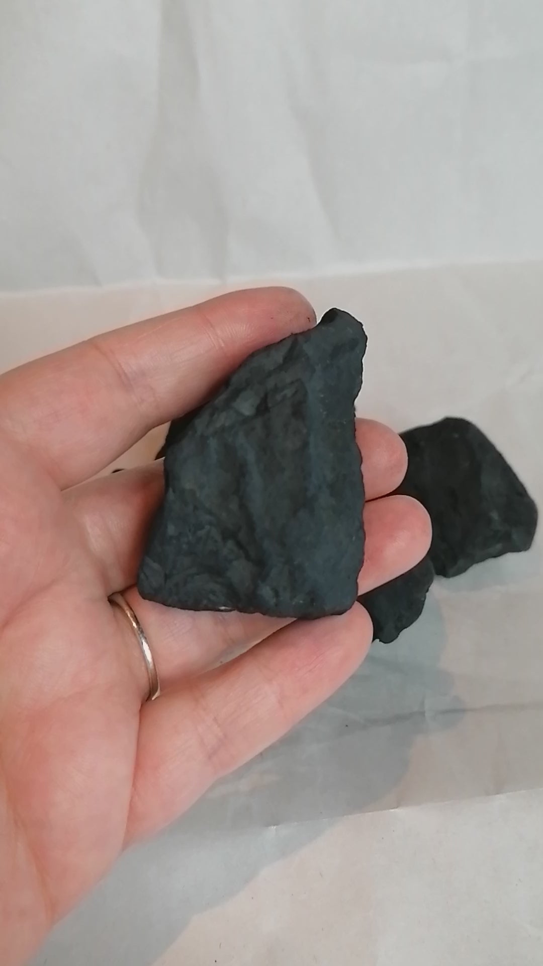 short video turning a piece of black shungite to view all sides