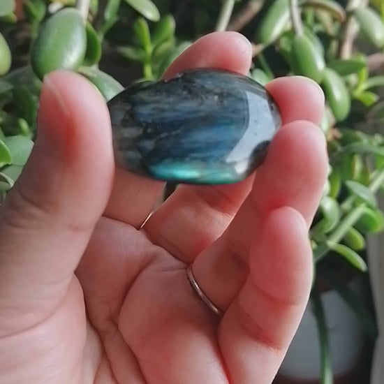 labradorite crystal heart with light blue and green flash