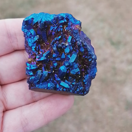 a dark blue aura druzy