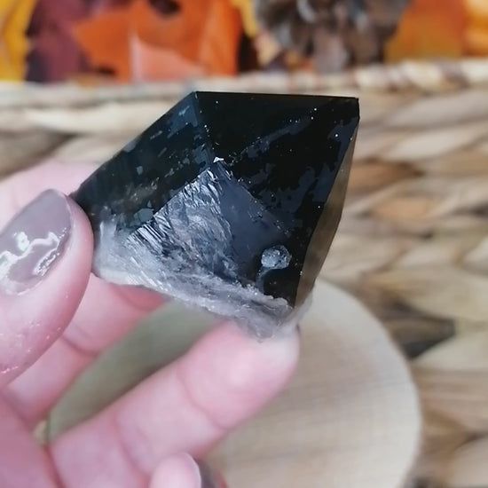 smokey quartz point short video in light