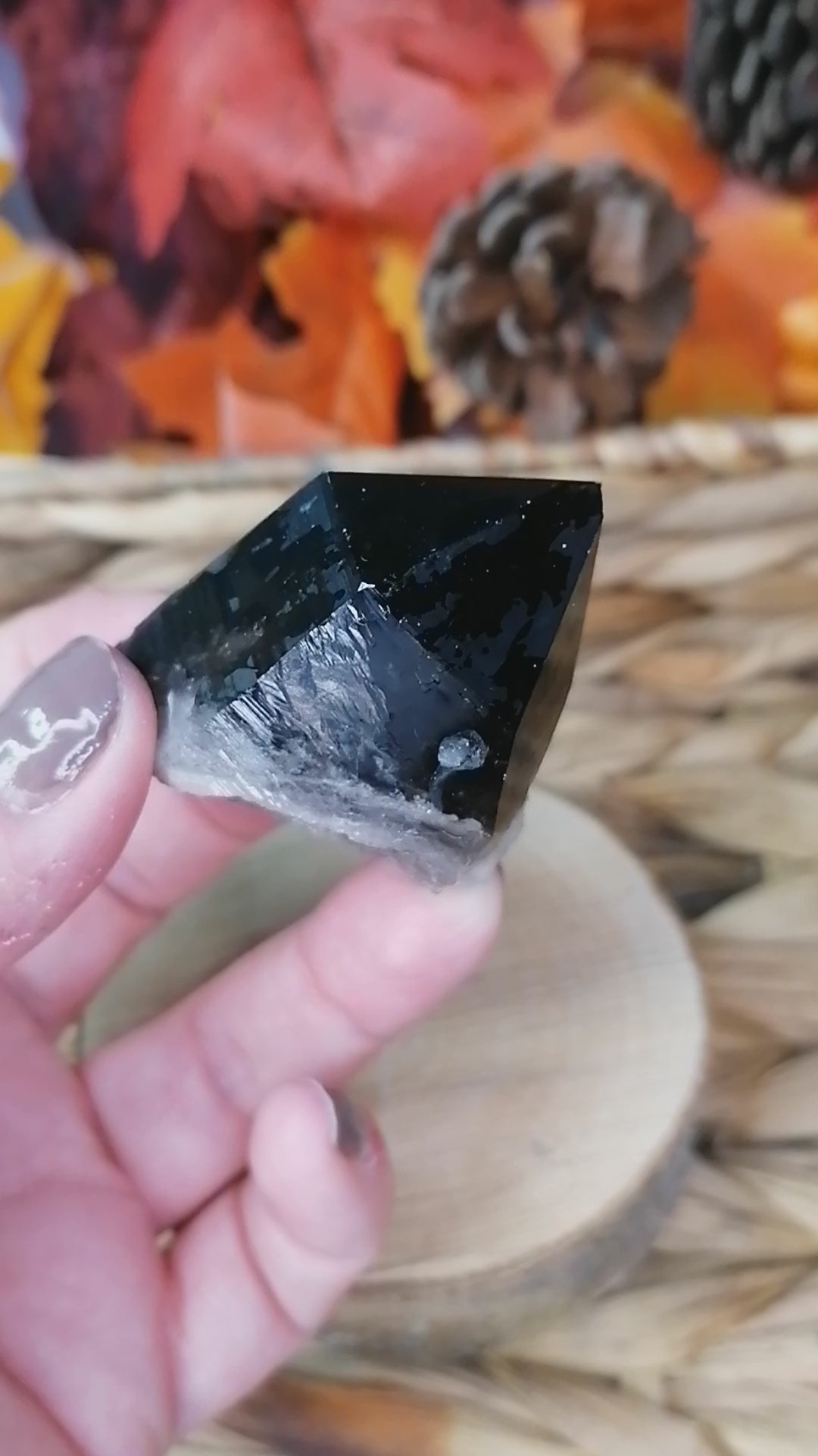 smokey quartz point short video in light