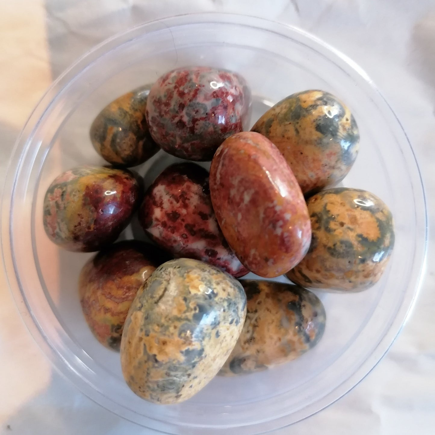 red, yellow and blue leopard skin jasper crystal tumblestones