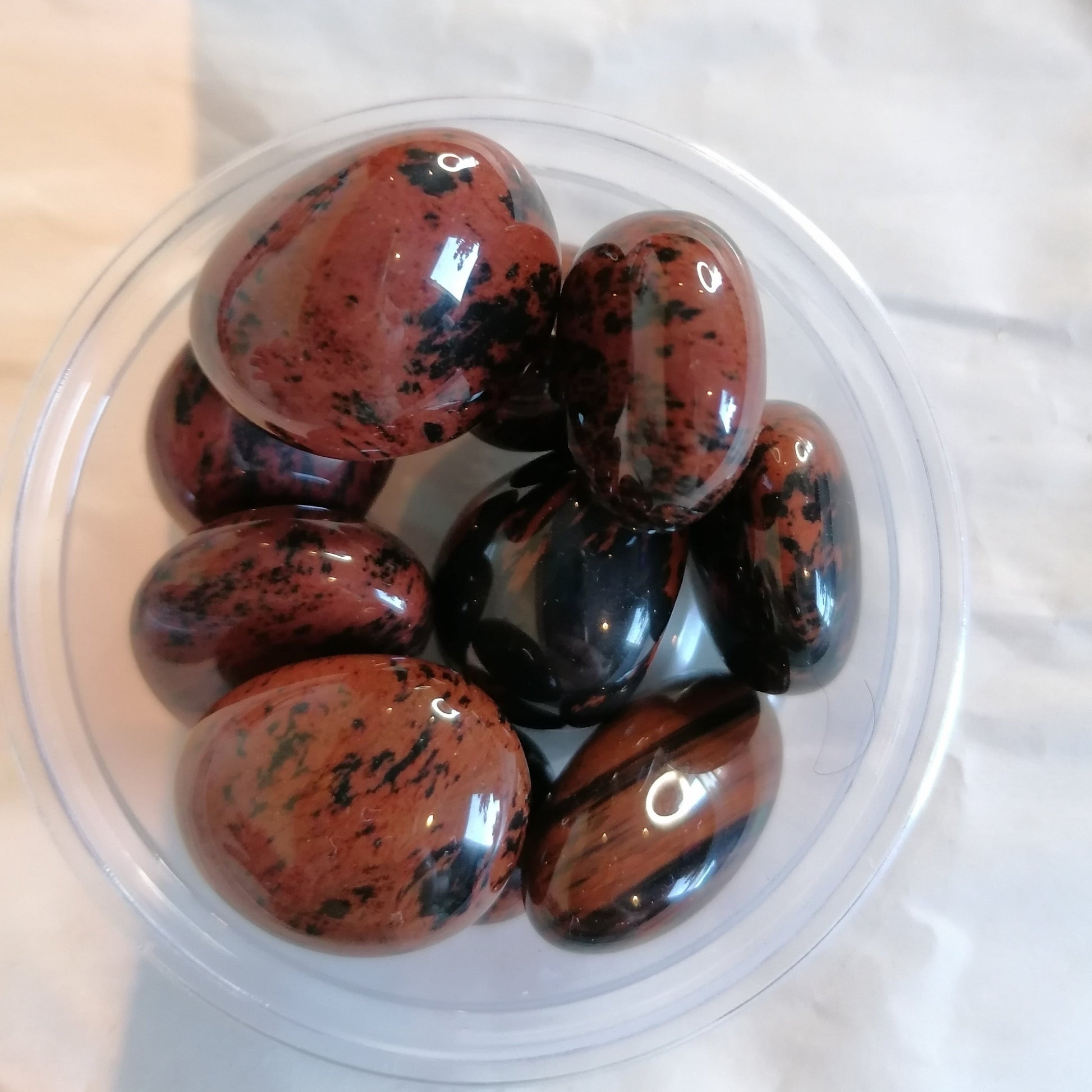 burgundy and black mahogany obsidian tumblestones