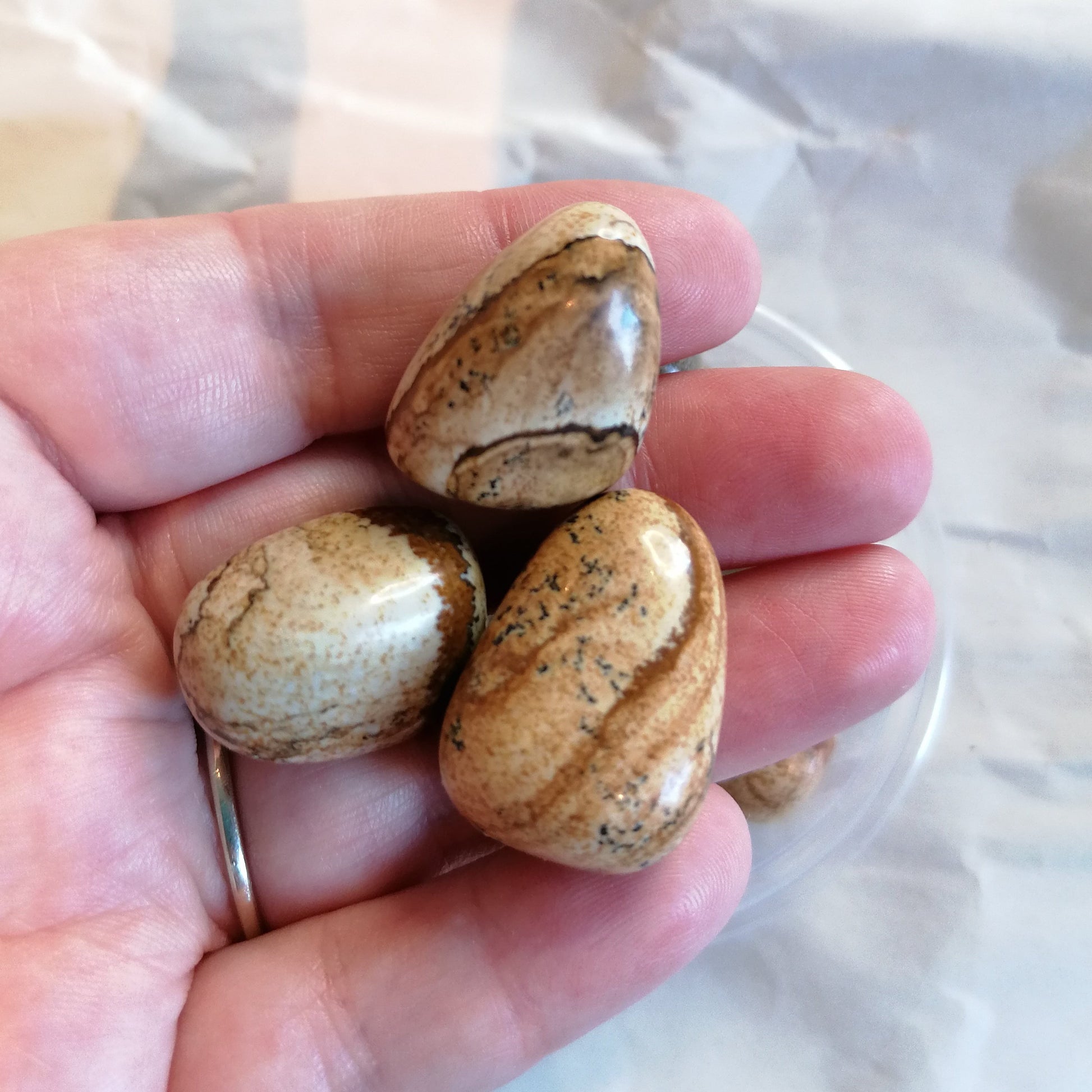 beige, yellow, and brown picture jasper tumbles