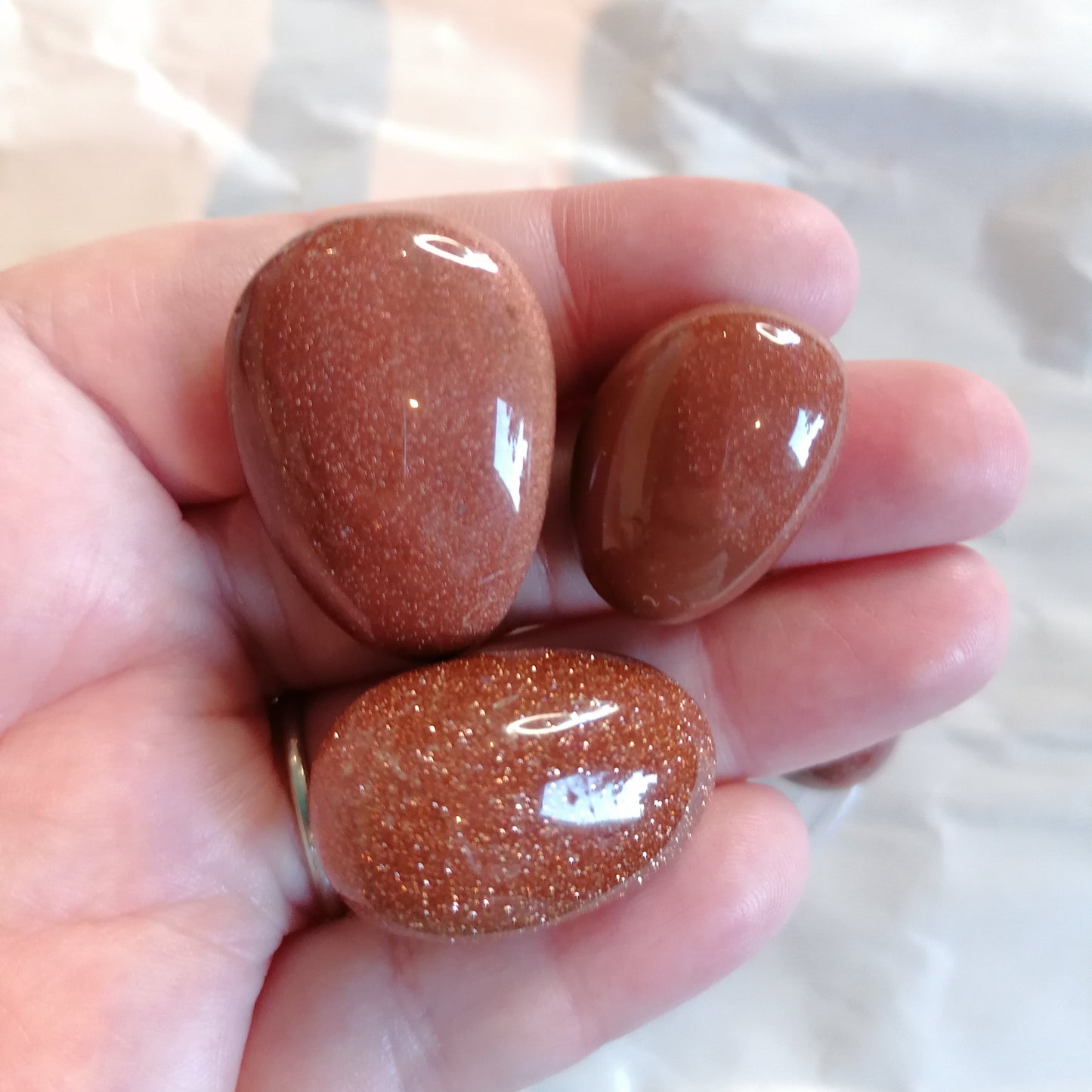 gold glittery goldstone crystal tumbles