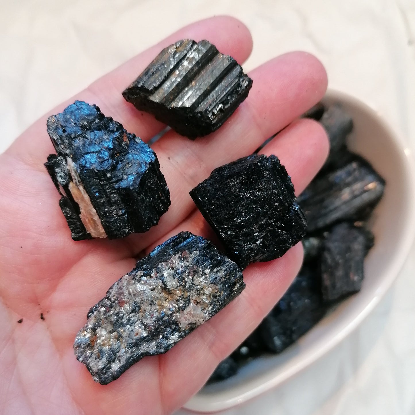 four raw black tourmaline chunks